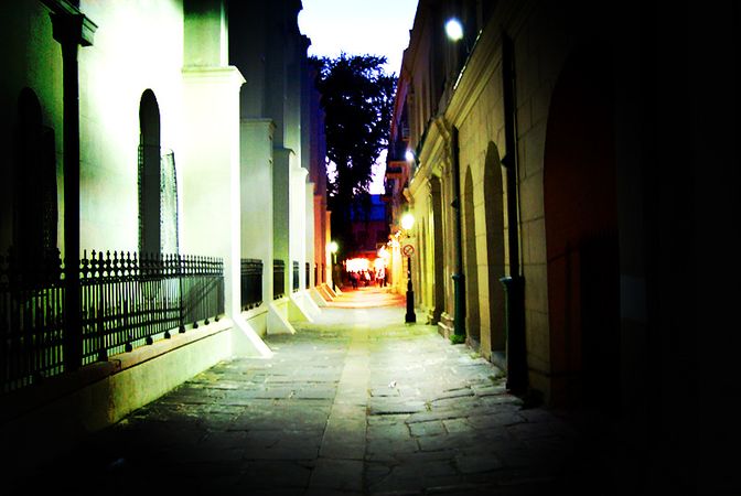 Pere Antoine Alley, to the right of St. Louis Cathedral.